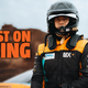 A photo of McLaren Extreme E driver Tanner Foust with the caption "Foust on Flying".